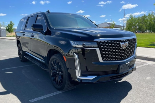Black Cadillac Escalade SUV